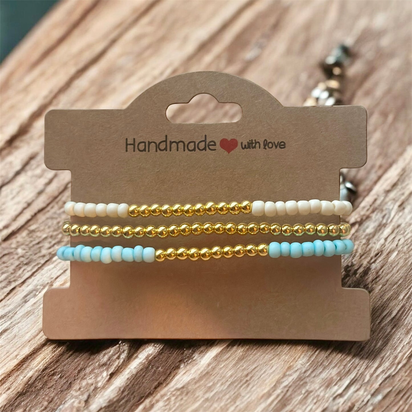 Light turquoise/cream with gold accents stackable bracelet set
